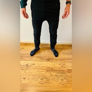 Men’s Cotton On denim stretch joggers solid black with moto details on the knee.